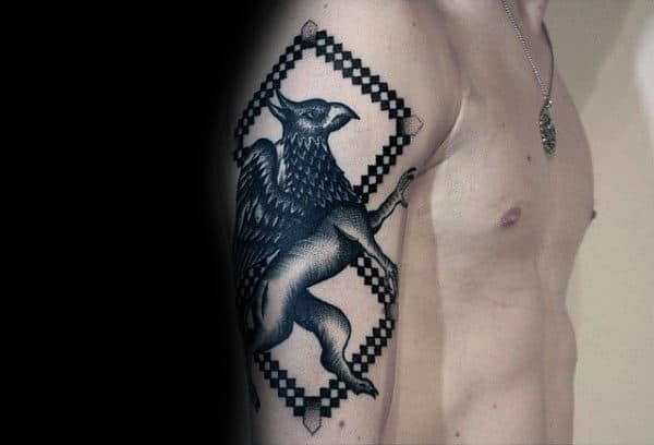 Pattern Griffin Arm Tattoo On Man