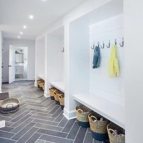 white mudroom with gray patter tiles