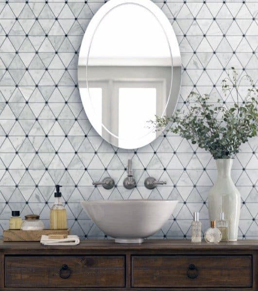 guest bathroom wood vanity white sink triangle wall tile design mirror