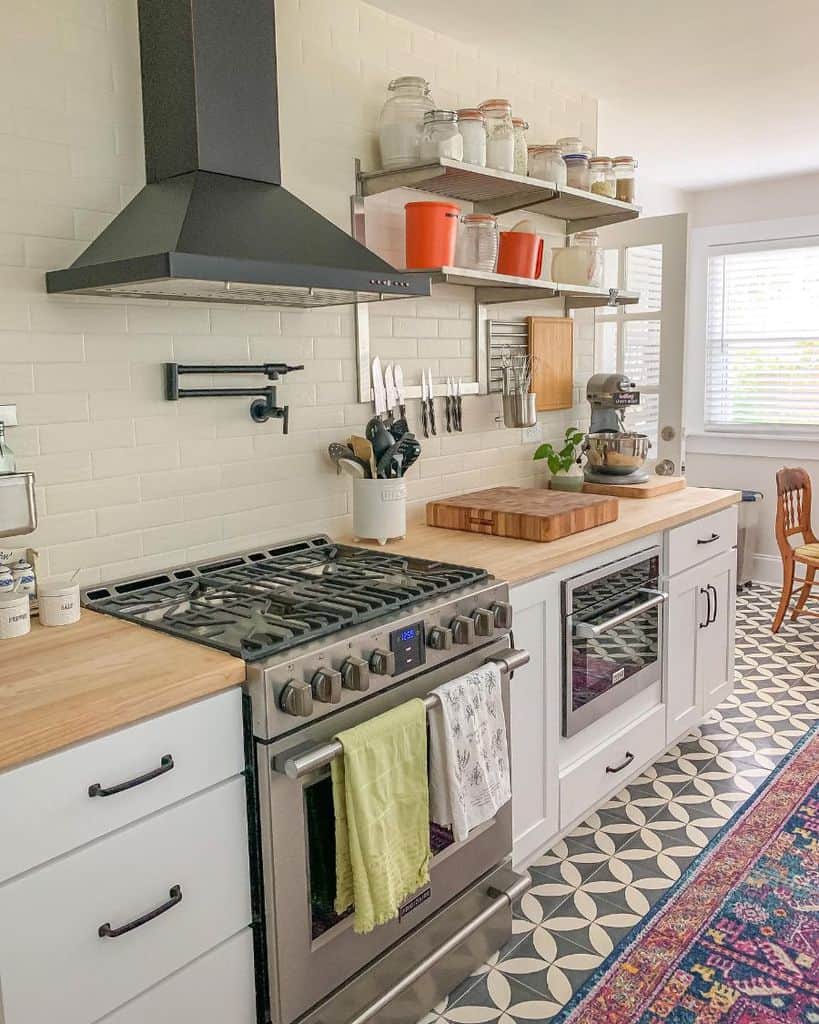 patterned kitchen floor tiles white brick backsplash
