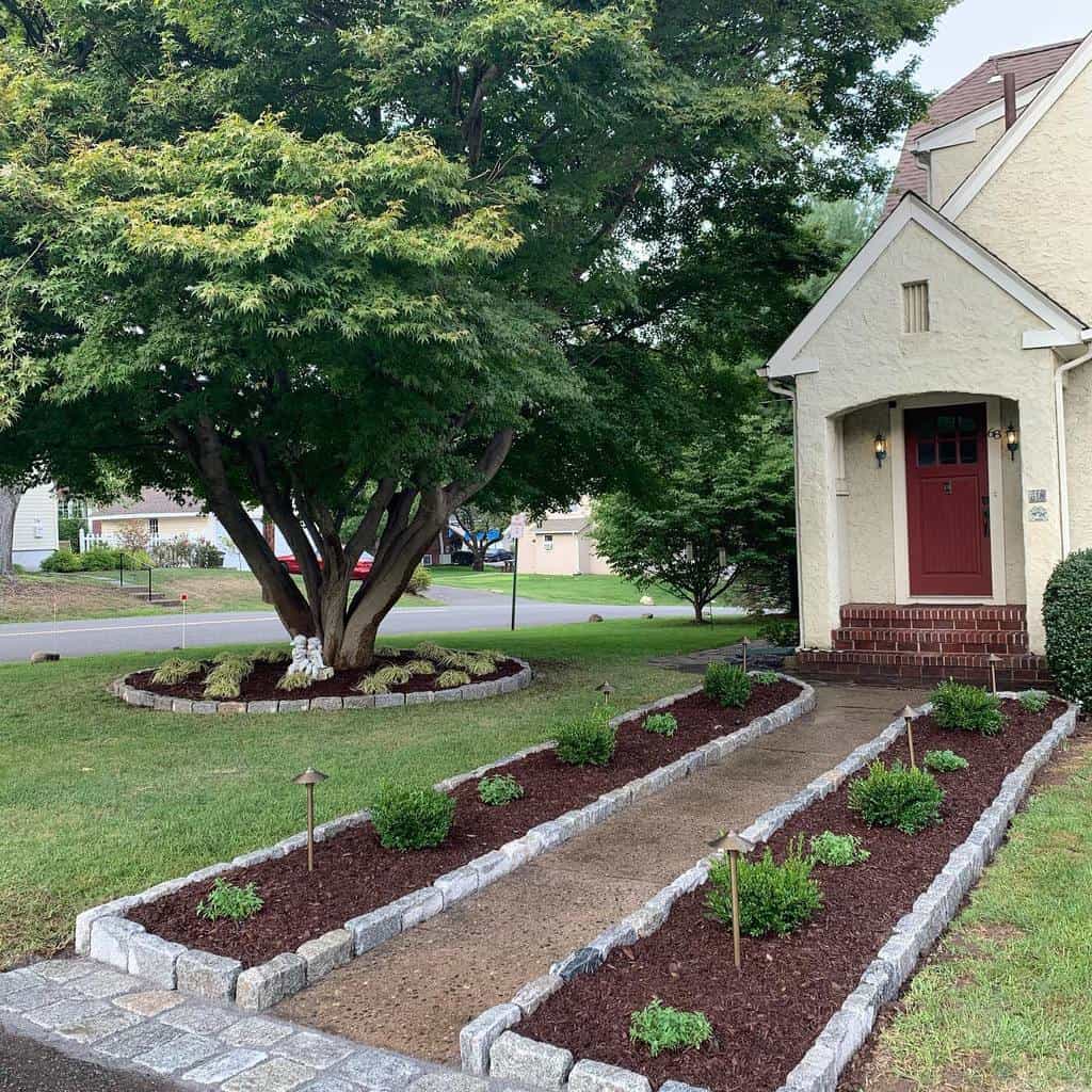 stone paver edging small shrubs front yard