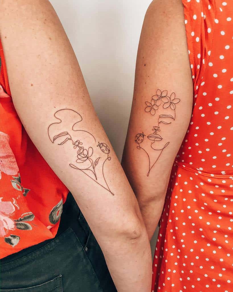 Matching sister tattoos featuring minimalist one-line designs of abstract faces, flowers, ladybugs, and nature-inspired elements