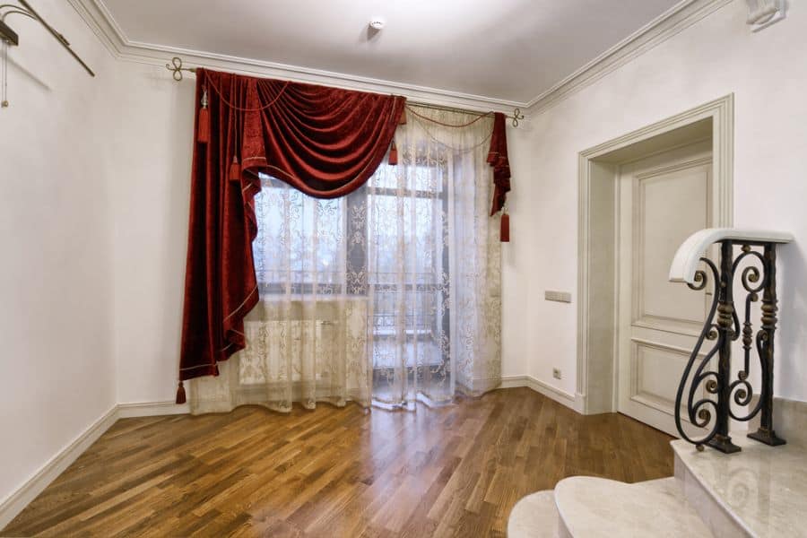 red velvet curtains empty room