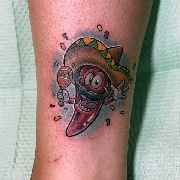 Cartoon-style chili pepper tattoo with a sombrero, mustache, and maraca, surrounded by festive confetti for a fun and lively design.