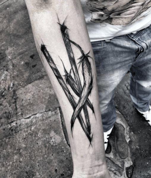 Black and grey chili pepper tattoo with a rough, sketch-style design, featuring sharp lines and bold shading for an intense and edgy look.