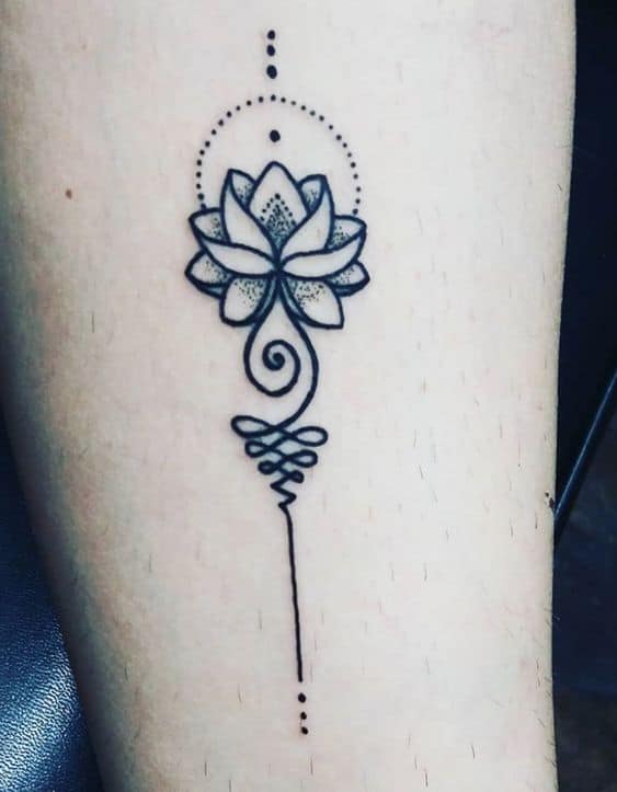 Unalome tattoo with a shaded lotus, symbolizing spiritual enlightenment, personal growth, and the journey toward inner peace.