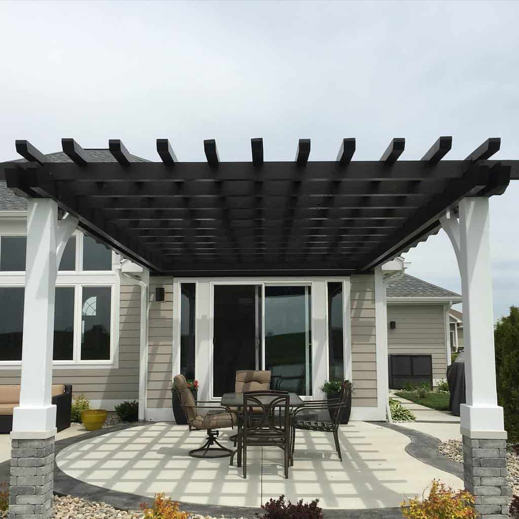 luxury patio with black painted wood pergola 