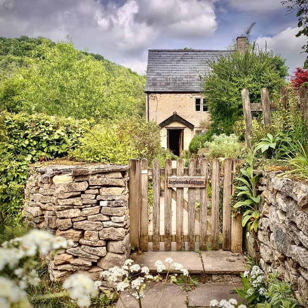 natural wood picket garden gate stone fence cottage