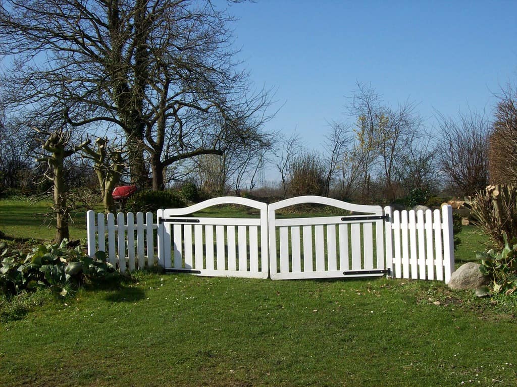 white picket fence and garden gate