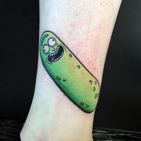 Simple and vibrant Pickle Rick tattoo with bold outlines and smooth green shading, placed on the ankle for a clean cartoon look.