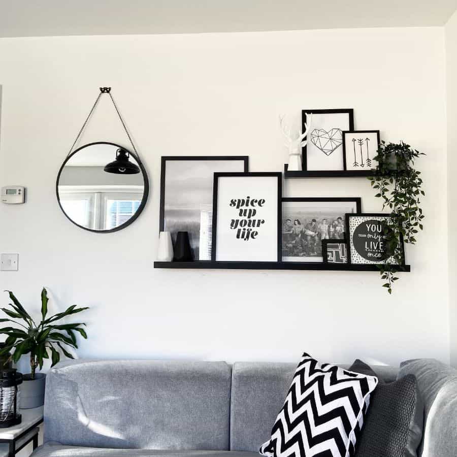 picture wall shelf in living room with gray sofa 
