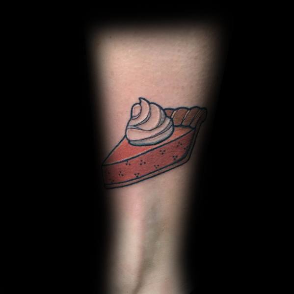 Simple and clean pie slice tattoo with whipped cream, featuring a classic design with bold outlines and a nostalgic dessert theme