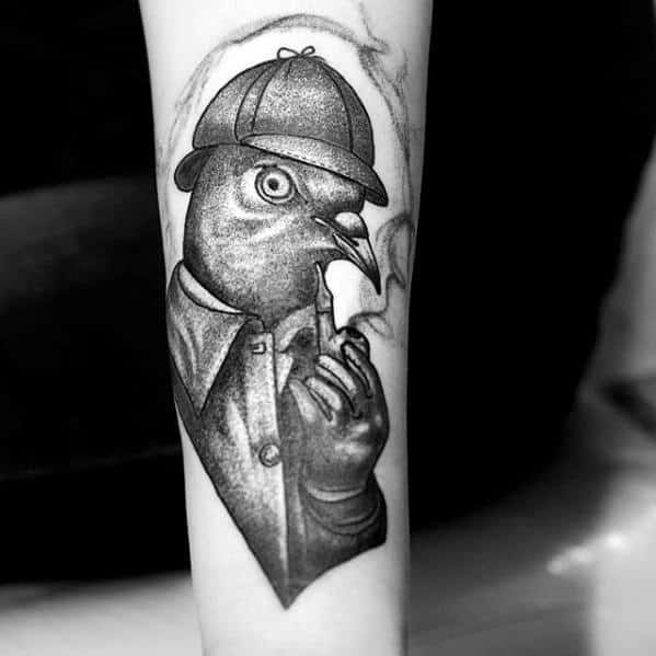 Detective-style pigeon tattoo in black and grey, wearing a trench coat and cap while smoking, blending noir mystery with playful charm.