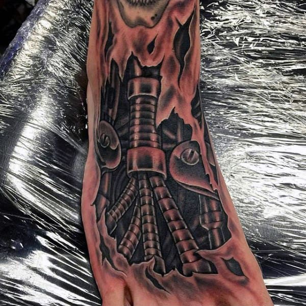 Pipes Piercing Through Skiln Tattoo On Foot