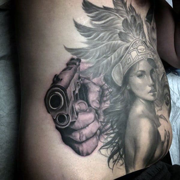 Pistol And Sexy Lady Tattoo On Torso For Guys