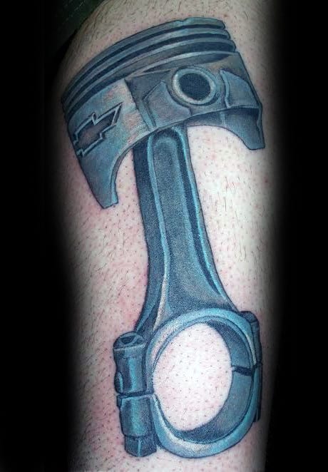 Piston With Chevy Logo Guys Arm Tattoo