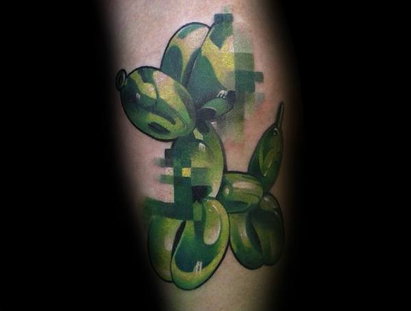 Surrealist tattoo of a green balloon dog with a pixelated glitch effect, blending realism with digital distortion for a modern artistic look.
