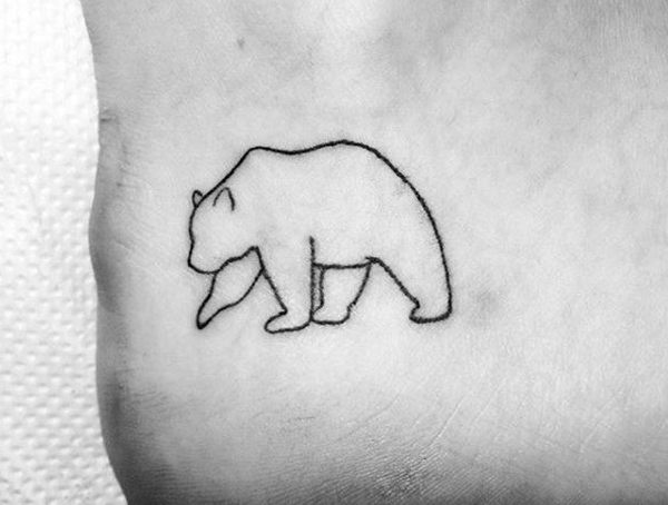 Ankle tattoo for men featuring a minimalist black line art outline of a walking bear.
