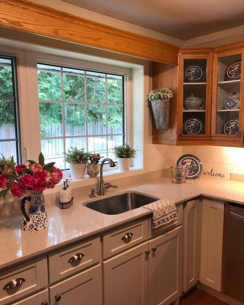 pot plants kitchen window white cabinets wood wall cabinet
