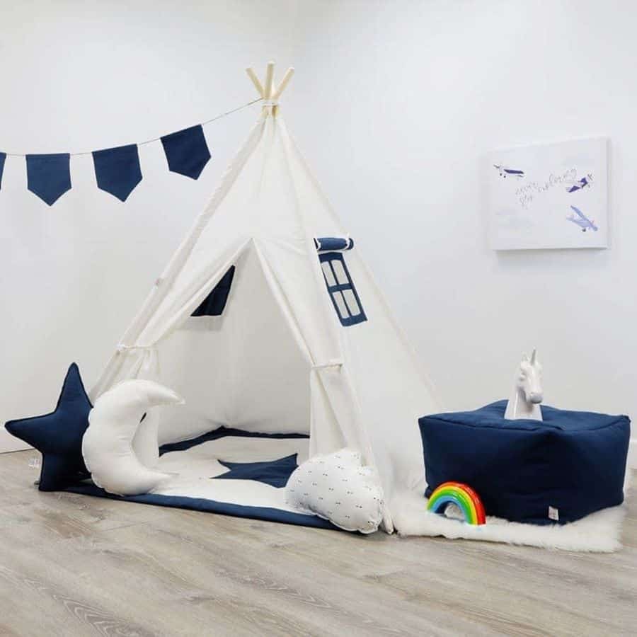 white and blue tent in playhouse