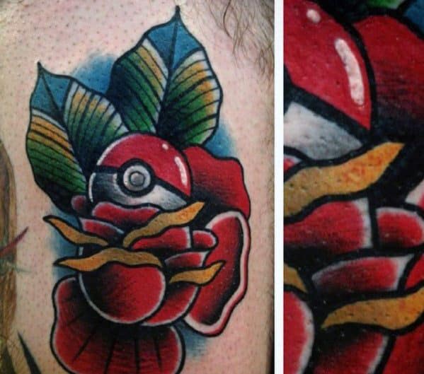 Traditional-style tattoo of a Pokeball nestled in a bold red rose with vibrant leaves and golden accents, done in thick black outlines and rich colors.