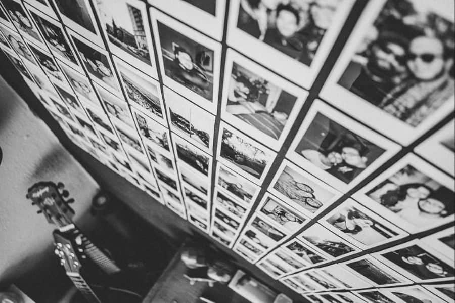 black and white polaroid photo wall 