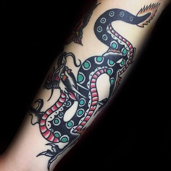 Polka Dot Traditional Dragon Mens Forearm Tattoo