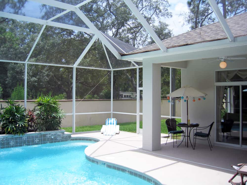 enclosed pool patio table and chairs garden bed