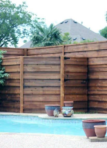 pool equipment fence rustic design