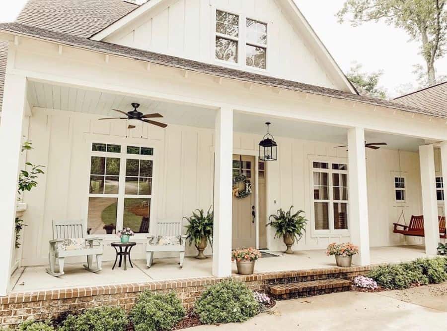 vintage farmhouse with brick porch 