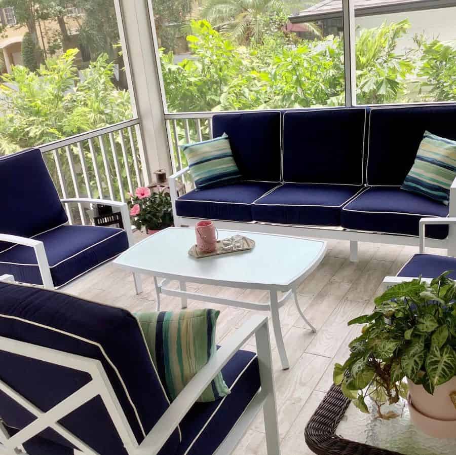 porch lanai room blue sofa and chairs