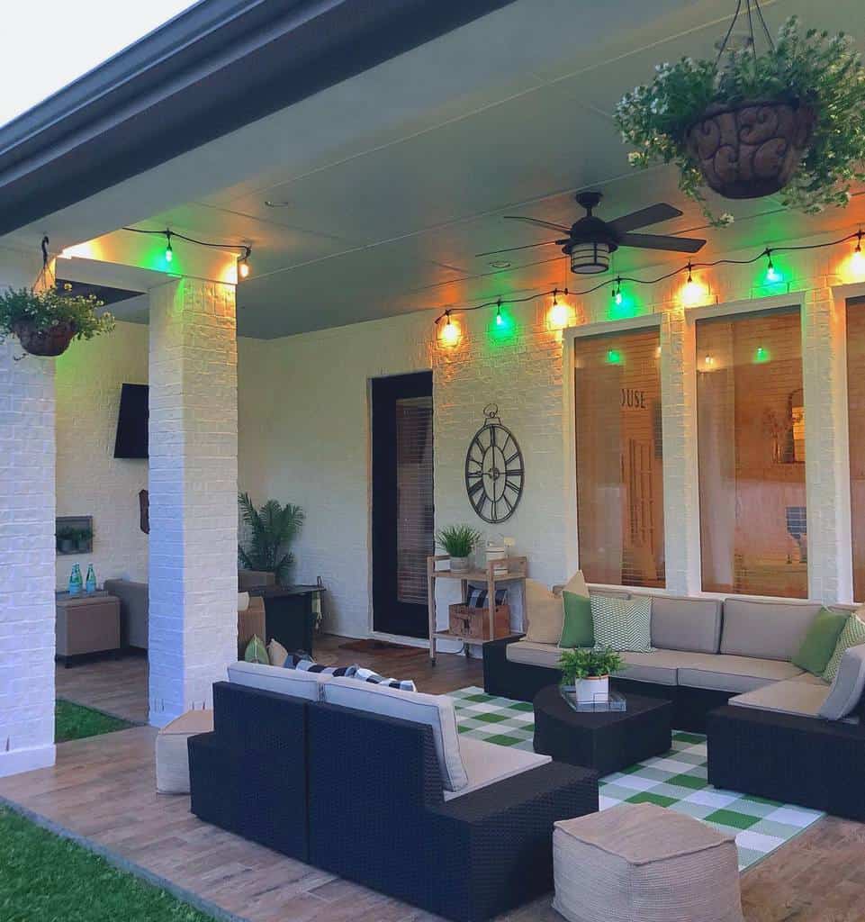 green lights backyard patio porch with wicker furniture