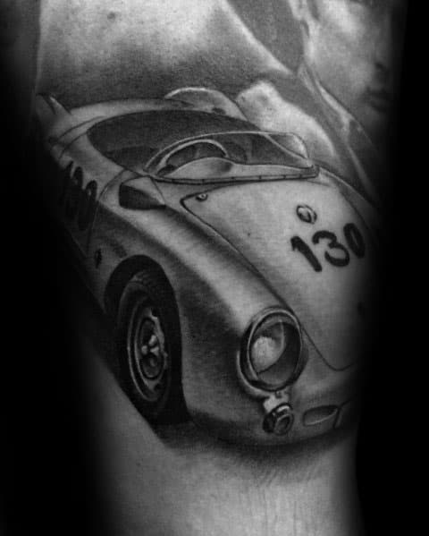 Classic Porsche racing car tattoo with intricate shading, featuring the iconic number "130" prominently displayed.