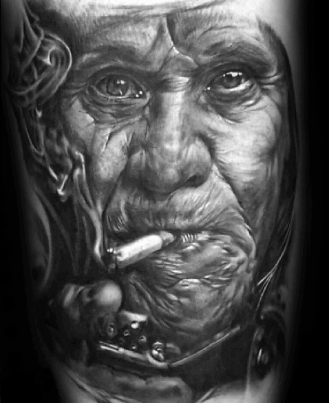 Tattoo of an elderly person with detailed facial features and a cigarette in their mouth