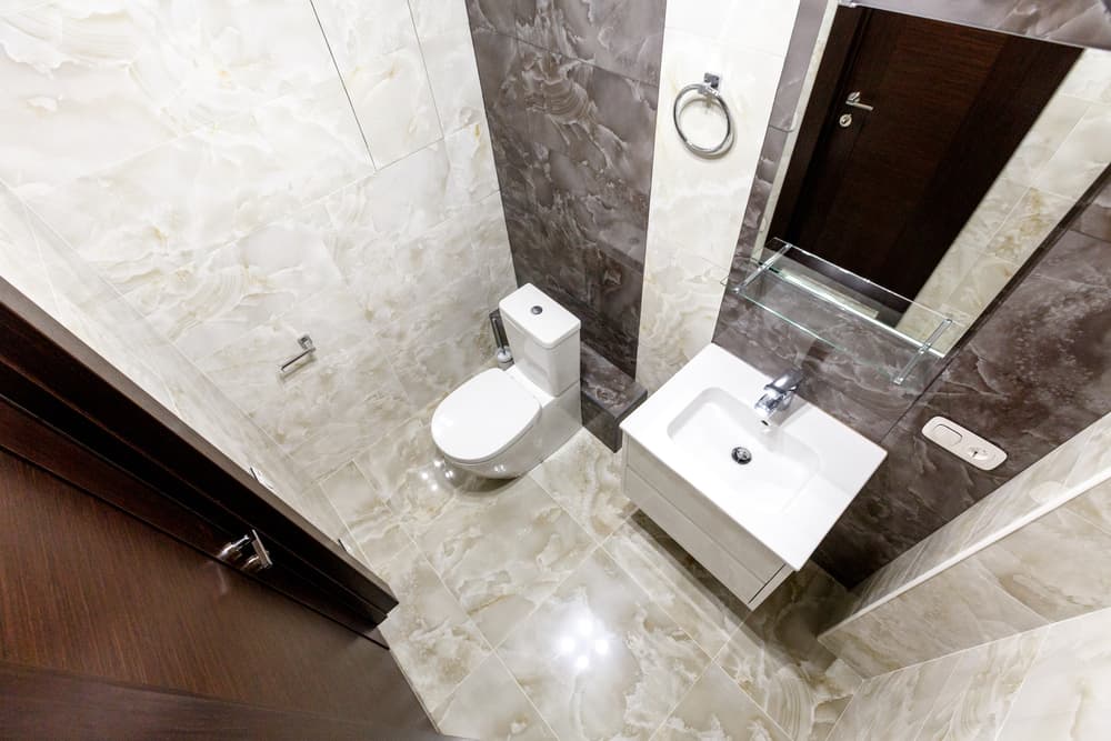 small half bathroom with tiles