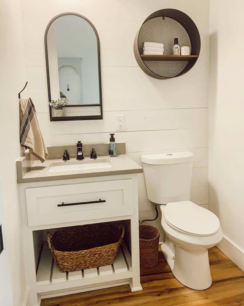 farmhouse white shiplap wall half bathroom