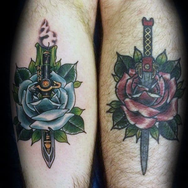 Matching Power Rangers tattoo set featuring the Dragon Dagger and Saba sword piercing through a white and red rose, with bold shading and color.
