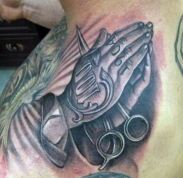 Praying Hands Barber Tattoo Holding Scissors On Mans Shoulder