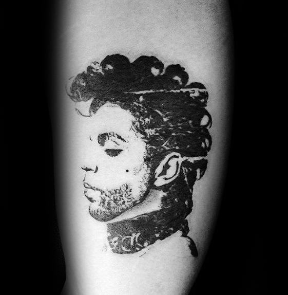 A bold silhouette tattoo of Prince's profile, emphasizing his iconic hairstyle and distinctive facial features