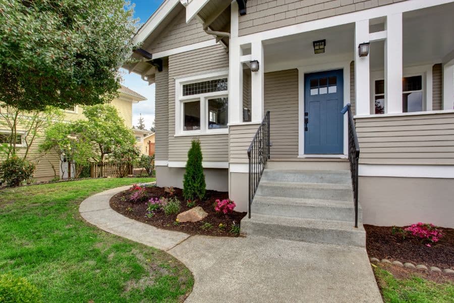privacy porch railing with blue door