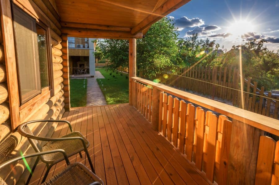 wood front porch with railing
