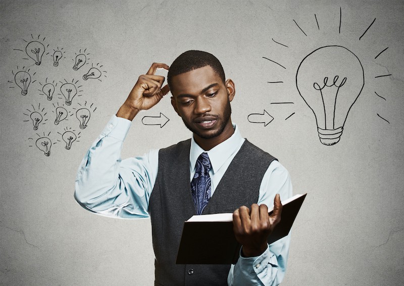 Intelligence,Knowledge.,Closeup,Portrait,Smart,Handsome,Man,Student,Holding,A