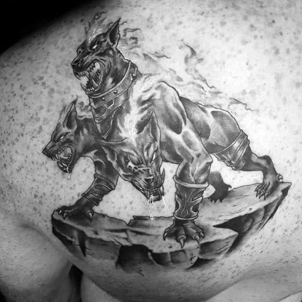 Protective Cerberus On Rock Edge Mens Shoulder Blade Tattoo