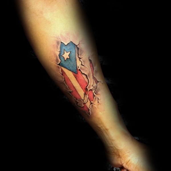 Puerto Rican flag tattoo with a ripped skin effect, revealing bold red, white, and blue colors with a star underneath.