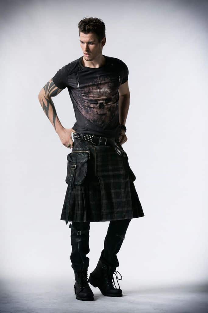 Man in long plaid black kilt