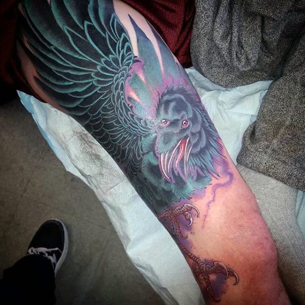 Purple And Grey Shaded Raven Tattoo Mans Arms