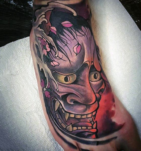 Purple Monster Face Tattoo On Foot