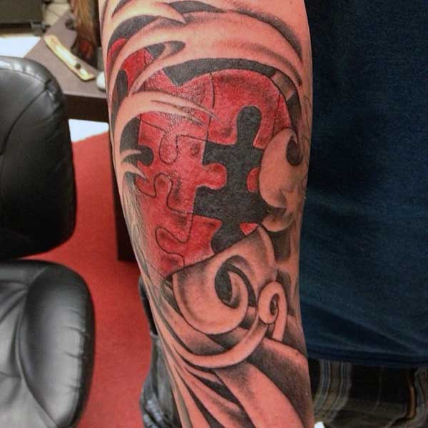 Puzzle Tattoo Guy Forearm Heart