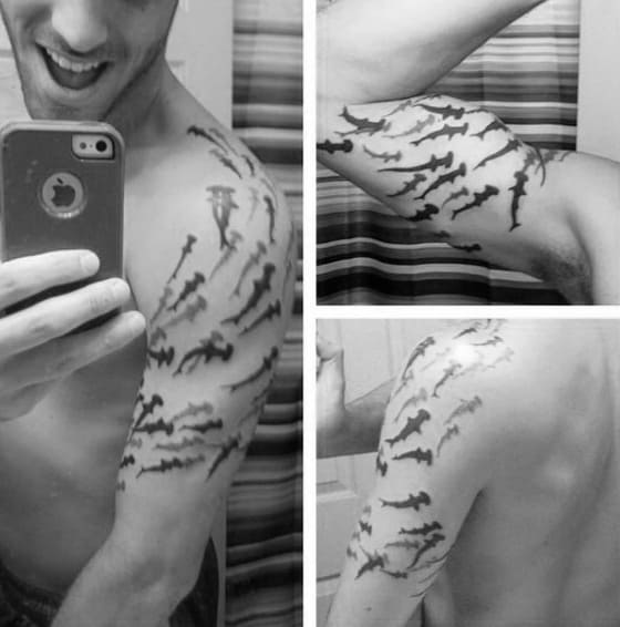 Quarter Sleeve Hammerhead Shark Swimming Around Bicep Mens Tattoo