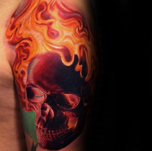Quarter Sleeve Male Tattoo With Flaming Skull Design